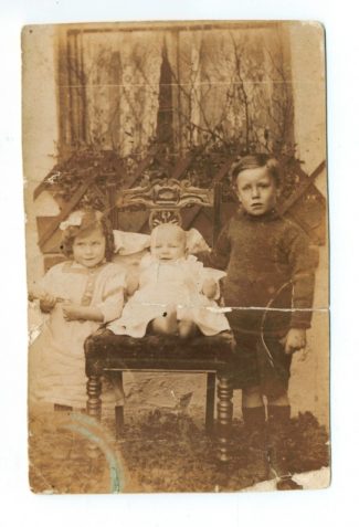 Photograph of Alfred and Florence Langrish's children: Ivy, George and Alfred Langrish