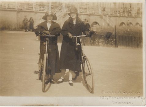 Photo of Daisy Smart and her sister Eve Smart with bicycles on Brighton seafront