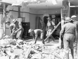 Air raid wardens clearing a bomb damaged house in 1940 | Image reproduced with kind permission from Brighton and Hove in Pictures by Brighton and Hove City Council