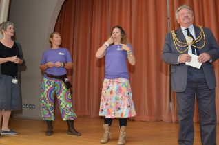 The Mayor's speech is signed for the deaf in the audience | Photo by Tony Mould