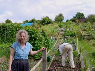 Sue and her husband working their plot | Photo by Simon Tobitt