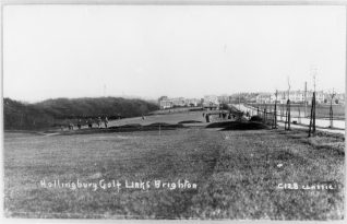 View down the golf course towards the new pavilion - This picture looks to have been taken on a Sunday when there was no golf judging by the attire of the walkers on the course. | HPGC Archive