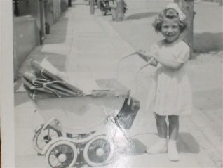 Sandra and her pram | From the private collection of Sandra Bohtlingk