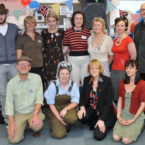 MyBH editor Jennifer Drury(front second right) and Spooks Drury (back right) with the library team at Coldean Library | Photo by Tony Mould
