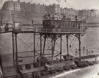 Detail of postcard showing monochrome view of the Brighton and Rottingdean Seashore Electric Railway, commonly known as the Daddy Longlegs. Produced in 1900. | Royal Pavilion and Museums' Image Store