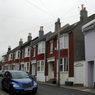 Houses at the north end of Belton Road, Round Hill; built in the early 20th century of brick, unlike the stuccoed houses found in the rest of the suburb. Some bricks came from the former Tower Mill which stood on the site until its demolition in 1913. | The Voice of Hassocks:Click on image to open large version