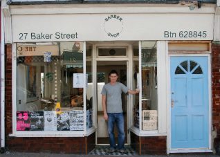 The shop is still a hairdressers owned by Julian who kindly posed for us | Photo by Tony Mould