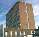 Photograph of City College looking up at the tower block