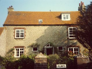 'Flints' - situated at the rear of Ovingdean Hall - built by Nathaniel Kemp c1792 and known then as 'The Bailiff's House'. It is a Grade II listed building - its walls are seventeen and a half inches thick. When Ovingdean Hall was a boys preparatory school in 1891 the house was used as a sanatorium. | Kindly loaned by the owners Mr & Mrs J G Davies of Ovingdean