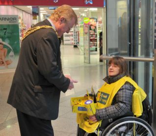 Volunteer collector in Churchill Square centre | Photo by Tony Mould