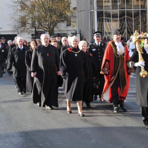 Mace bearer Robbie Robertson, The Mayor and Mayoress Councillor and Mrs Peltzer Dunn, lead the march in Hove | Photo by Tony Mould