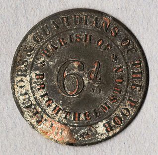 This is a six pence embossed metal token from Brighthelmston Parish Directors and Guardians of the Poor, dating to the early nineteenth century. The inscription of 'Directors & Guardians of the Poor' is around the edge of the token. The denomination of the token, '6d' is embossed in the centre of the token and is encircled by the inscription 'Parish of Brighthelmston'. The Directors and Guardians of the Poor controlled the administration of the poor law in Brighton.  The token was issued as poor relief from the Parochial Offices at Church Street in Brighton. | Reproduced courtesy of Royal Pavilion, & Museums, Brighton & Hove