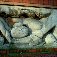 Loaves and fishes sculpture by  John Skelton