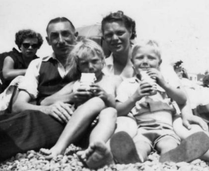 With Mum and Dad on the beach | From the private collection of Jennifer Tonks