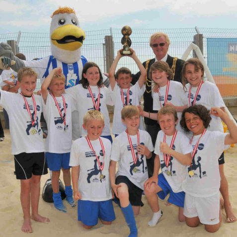 The 'England' team with The Mayor, Councillor Geoff Wells and 'Gully' the Seagulls mascot | Photo by Tony Mould