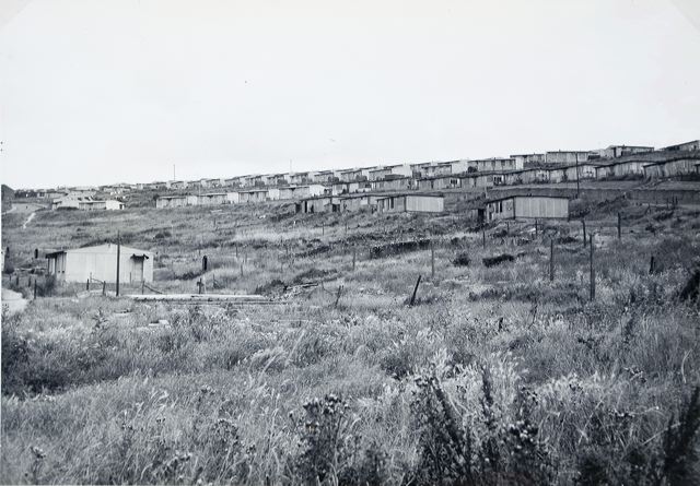 These were built in the late 1940's as a temporary extension of the pre-war Whitehawk Council Estate. They were designed to have a life of about 10 years, and soon after that period had elapsed, their removal commenced. View from the foot of Findon Road with Nuthurst Road seen at the extreme left. Subsequently, this area was largely given over to 