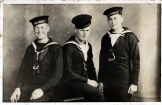 Photo of Charles Mitchell (standing) and his friends who were all crew on HMS Hood | Contributed to the Letter in the Attic by Christine Desborough