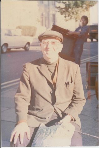 Photo of Ronald Arthur Kessler sitting outside in a street in Brighton