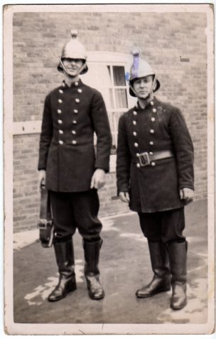 Photograph of Albert Catten and Arthur Johnson in their Fireman's uniforms