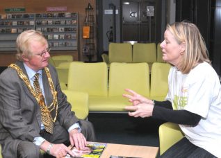 The Mayor of Brighton and Hove, Councillor Geoffrey Wells and the living 'book' he borrowed | Photo by Tony Mould