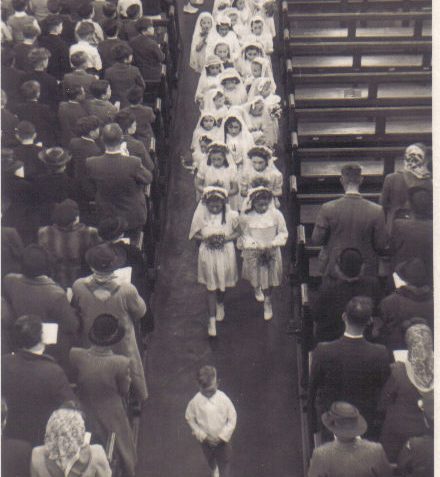 Procession out of the church led by Anthony Daly