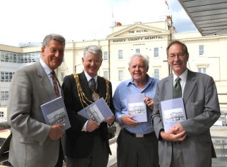 Author Harry Gaston, (2nd right) with Mayor Garry Peltzer Dunn at the book launch