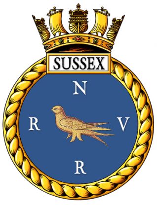 The Ship's badge for HMS SUSSEX - this is the sane design as issued to the WW2 Cruiser of that name but with the letters RNVR added to indicate the establishments reserve function. | Artwork by Tony Drury