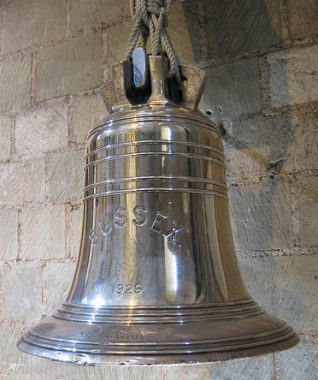 The Ship's bell from H.M.S. Sussex in Chichester Cathedral where it is currently on display. | From a private collection