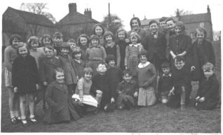 Image shows Eileen with her fellow-evacuees from Brighton in Yorkshire | Photo from private collection of Eileen Franchi