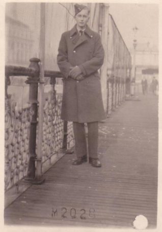 Tony Simmonds on Brighton Pier when it re-opened Christmas 1947. Tony is pictured wearing his RAF uniform. | From the private collection of Tony Simmonds