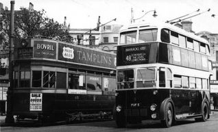 Image shows the Aquarium terminus, with Tram #25 on the Ditchling Road Route 'D' and Brighton Corporation Trolleybus #5 on Route 48 [previously Tram Route 'L'] bound for Lewes Road. | Image from the picture gallery of John King, reproduced with permission from the David Bradley Online website.Tram and Trolley bus at the Aquarium