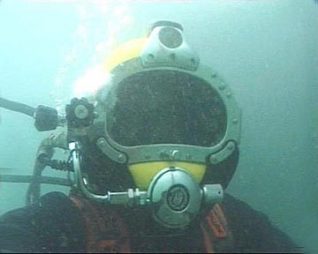 Sean wearing diving helmet | Photograph by Sean Clark