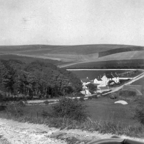 Woodingdean Farm photographed from Ovingdean c1920 - what is now the Falmer Road seen in the background | Kindly loaned by Mrs Edna Curtis of Woodingdean