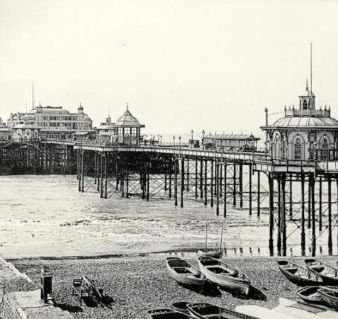 West Pier 1890 showing the recently added windbreaks. | Image reproduced with kind permission from Brighton and Hove in Pictures by Brighton and Hove City Council