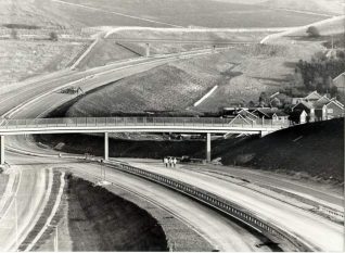 Construction of the Bypass, c. 1988: Construction of the bypass with construction workers and machinery. Photograph Copyright Evening Argus. | Image reproduced with kind permission from Brighton and Hove in Pictures by Brighton and Hove City Council