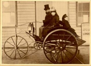 Magnus Volk at the controls of his Electric Dog-Cart outside Volk's Electric Railway office, Madeira Drive in October 1887. | Image reproduced with kind permission from Brighton and Hove in Pictures by Brighton and Hove City Council