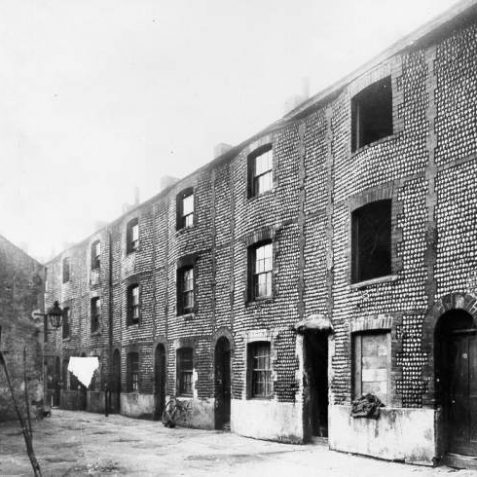 Flint and Cobble Buildings , c. 1910; A row of houses in the Carlton Hill area, built in c.1790 of flint and cobble-stones. These were probably demolished in the 1930s as part of Brighton Borough Council's ambitious slum-clearance programme. | Image reproduced with kind permission from Brighton and Hove in Pictures by Brighton and Hove City Council