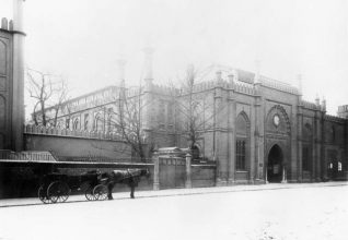 Entrance to Brighton Library and Museum, April 1900: The entrance to Brighton Free Library and Museum in Church Street, designed by the borough surveyor Philip Lockwood in 1872-74. Soon after this photograph was taken, a new entrance was built and the further ornamentation was added to the facade. | Image reproduced with kind permission from Brighton and Hove in Pictures by Brighton and Hove City Council