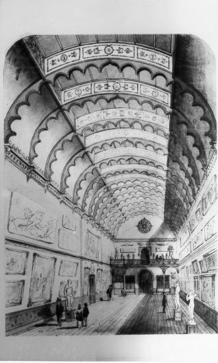 Design for Interior of Brighton Art Gallery, c. 1870: A design for the planned interior of Brighton Art Gallery by Philip Lockwood, Borough Surveyor. The gallery opened in 1873 in part of the former Royal stables, remodelled by Lockwood in 1869 for a public museum and library. The gallery as built has an altered roof design constructed in the form of a shallow barrel-vault. This gallery formerly housed the permanent collection, but currently displays a collection of Art Deco and Art Nouveau furniture and ornaments | Image reproduced with kind permission from Brighton and Hove in Pictures by Brighton and Hove City Council