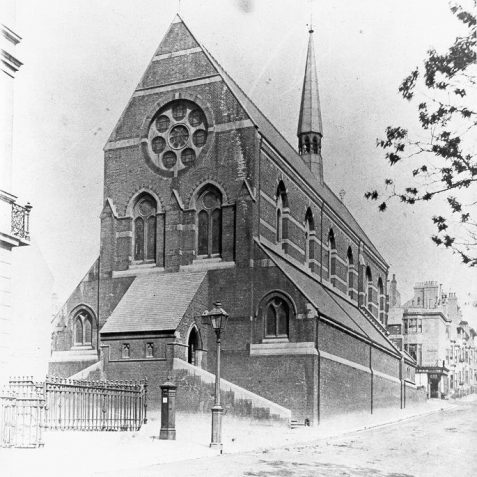 St Michael's Church, c. 1870: St Michael and All Angels Church on Victoria Road was designed by G. F. Bodley for Reverend Charles Beanlands and built between 1861-62. It was the first brick-built church in Brighton. The interior includes stained glass by William Morris and Company. This photograph shows the church from the west. | Image reproduced with kind permission from Brighton and Hove in Pictures by Brighton and Hove City Council