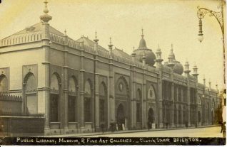 Public Library, Museum and Art Gallery, Church Street, c. 1905: The Library entrance on the right was added in 1902 when the Victoria Public Library opened within the building. The arched entrance under the clock led directly into the large central hall of the Museum and Art Gallery. The entrance to the Art Gallery and Museum continued to be used until about 1910, when it was bricked up to form a window, requiring the use of the library entrance. | Image reproduced with kind permission from Brighton and Hove in Pictures by Brighton and Hove City Council