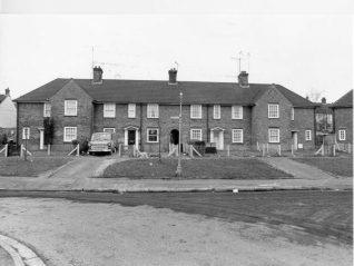 A row of four houses in Newick Road, North Moulsecoomb. This estate of 390 houses was built between 1926-30. Photograph Copyright Evening Argus. | Image reproduced with kind permission from Brighton and Hove in Pictures by Brighton and Hove City Council